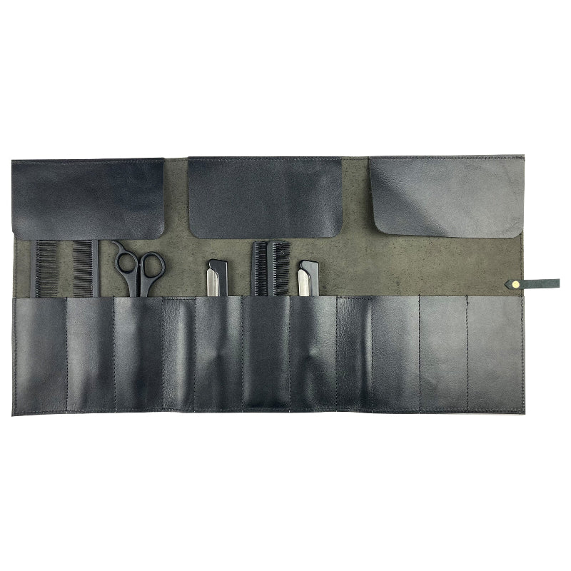 Roll-up tool case with grooming tools on a white background