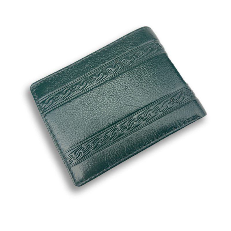 Green leather wallet with embossed design on a white background