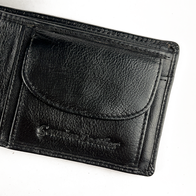 Black leather wallet on a white background