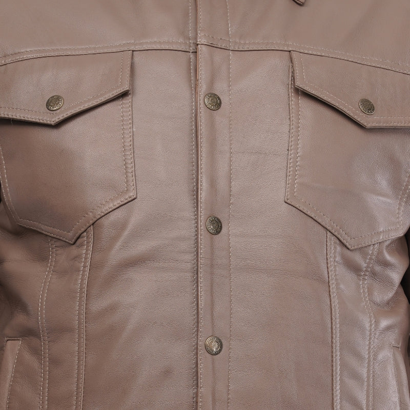Close-up of a beige jacket with button details