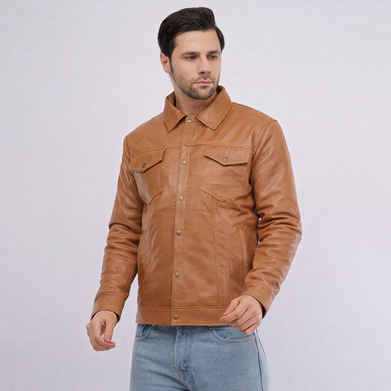 Man wearing a brown leather jacket on a light gray background