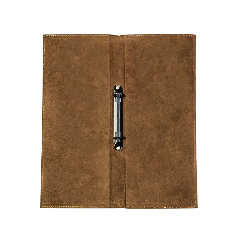 Brown leather menu cover with a clip on a white background