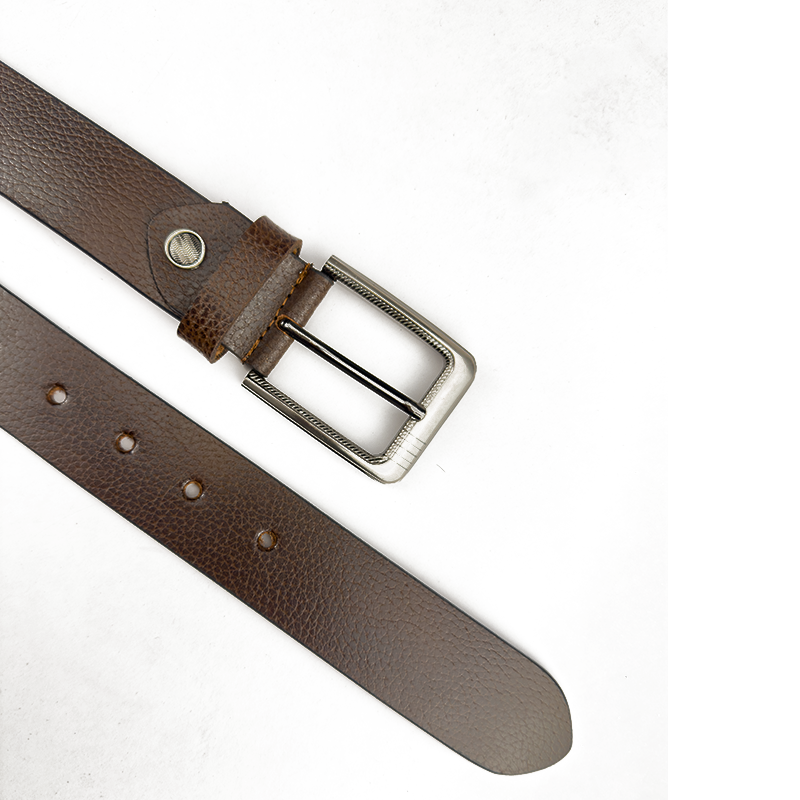 Brown leather belt with a silver buckle on a white background