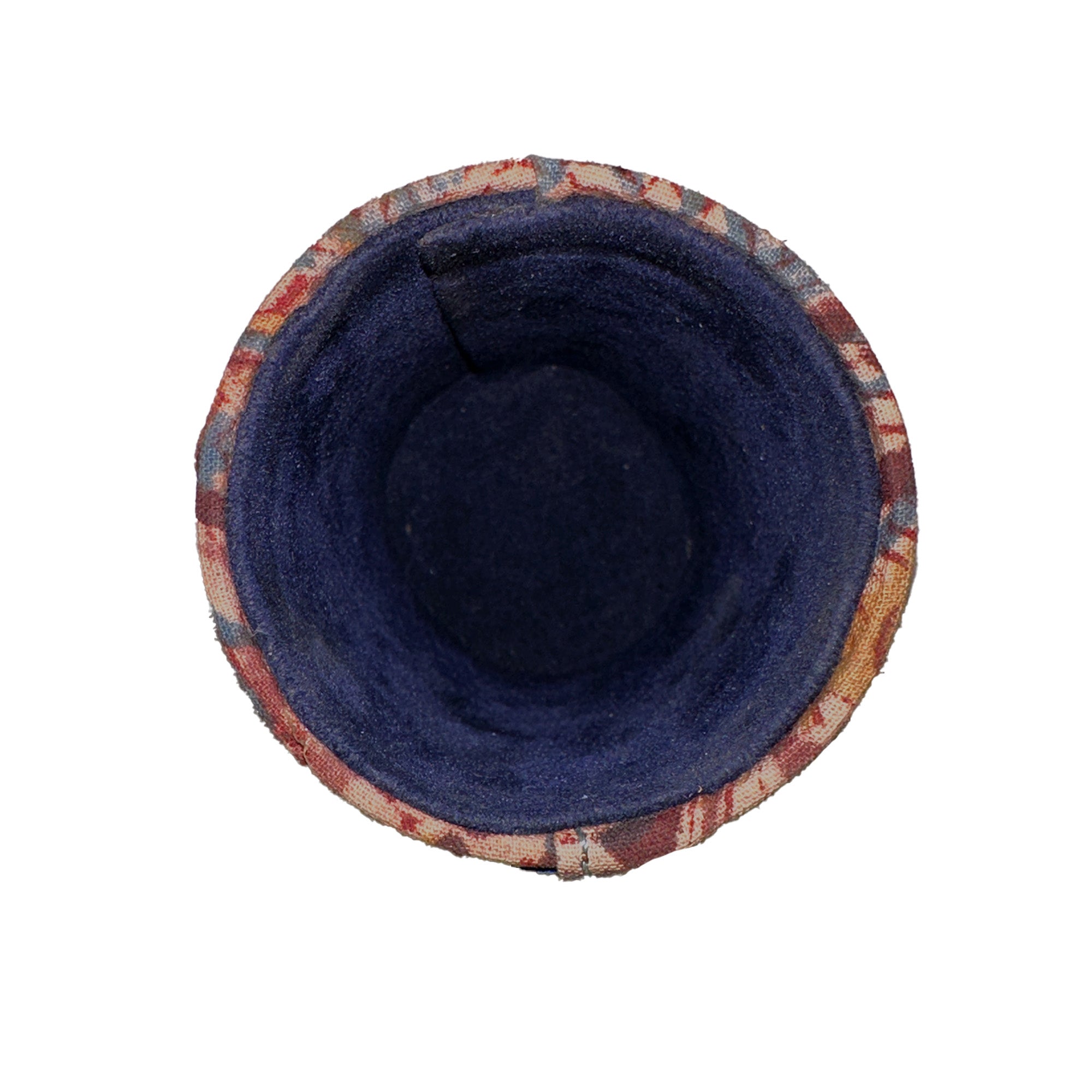 Round fabric pet bed with plaid rim on a white background