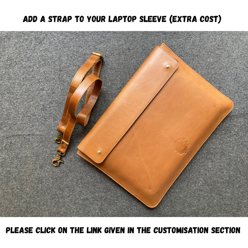 Brown leather laptop sleeve with an attached strap on a gray background
