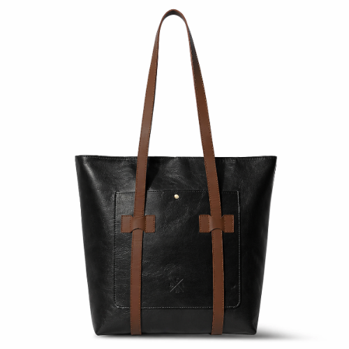 Black tote bag with brown straps on a white background