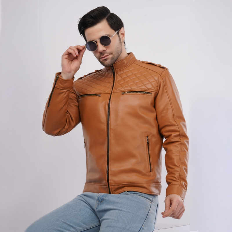 Man wearing a brown leather jacket and sunglasses on a white background