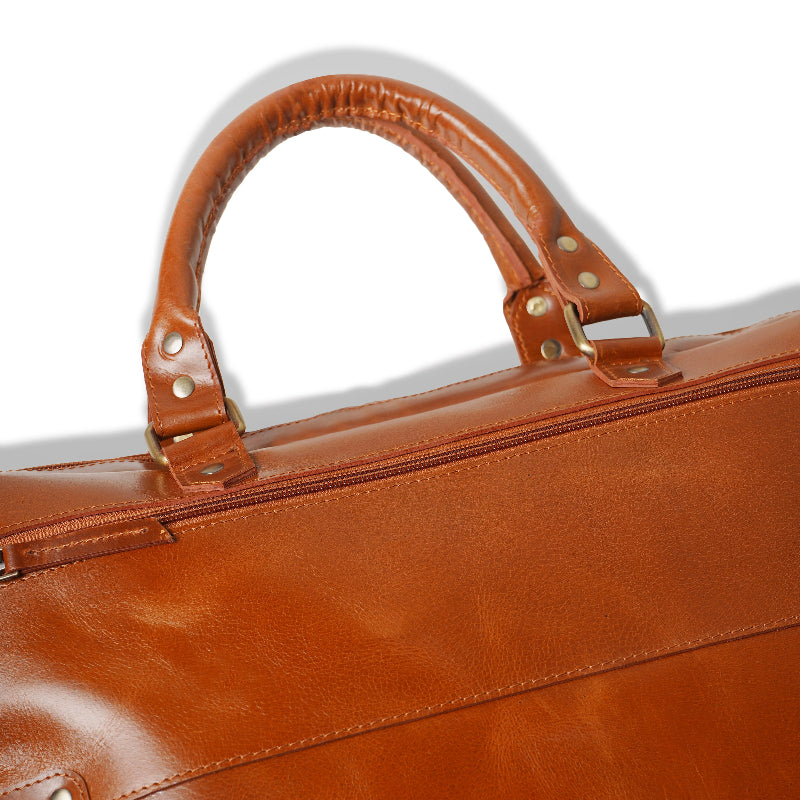 Brown leather briefcase with handle on a white background
