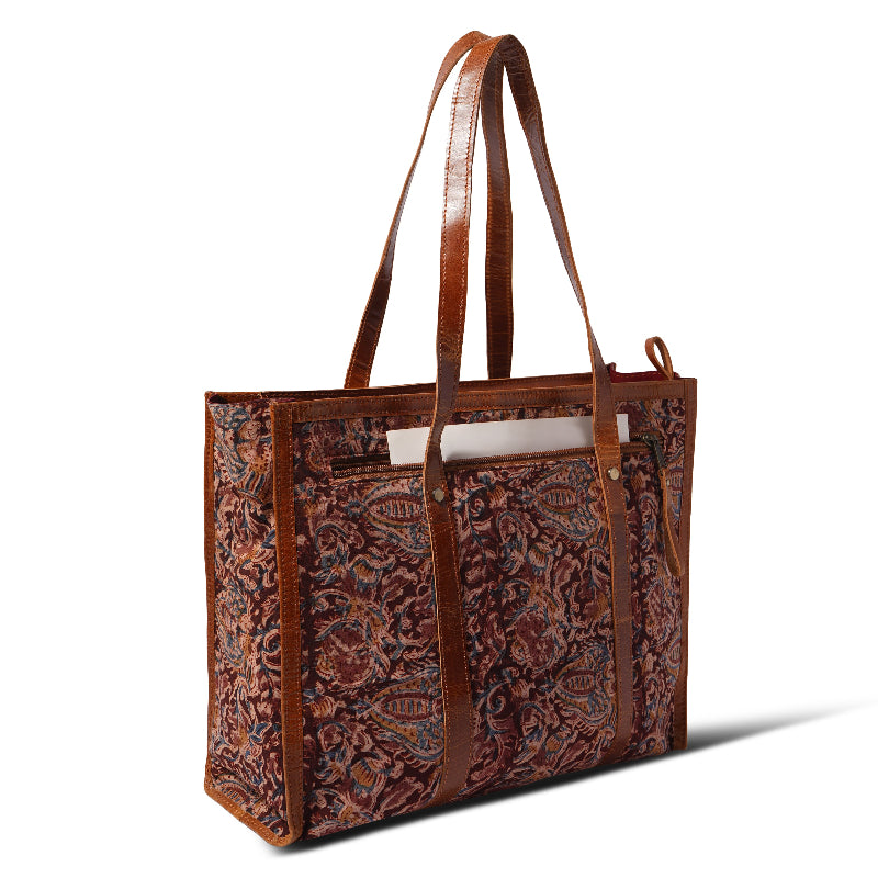 Brown tote bag with paisley pattern on a white background