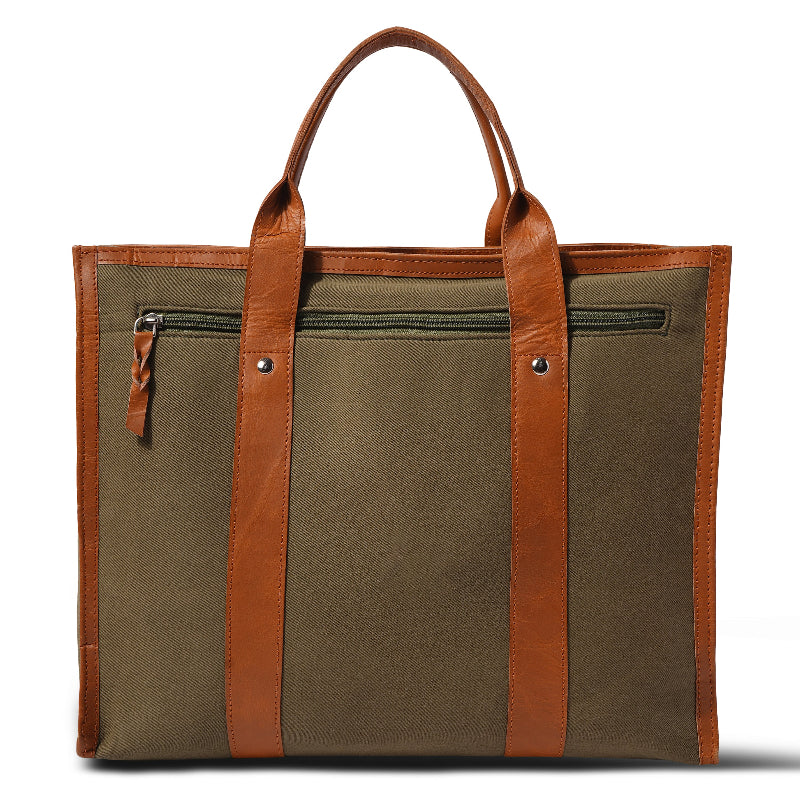 Green tote bag with brown leather straps on a white background