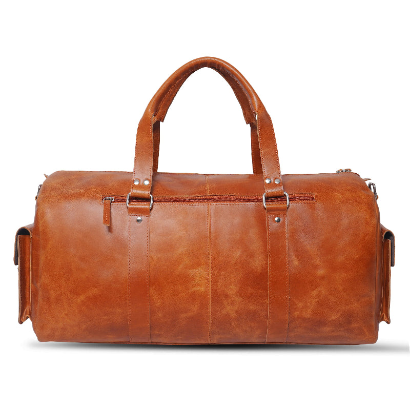 Brown leather duffel bag on a white background