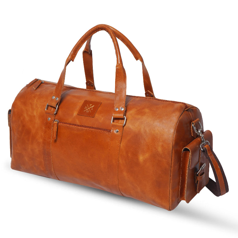 Brown leather duffel bag on a white background