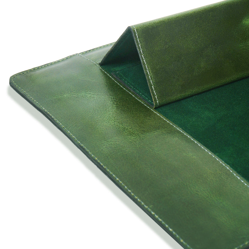 Close-up of a green leather sleeve on a white background