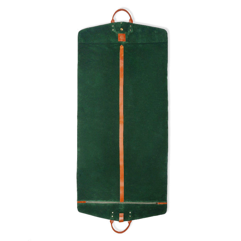 Green garment bag with brown straps on a white background