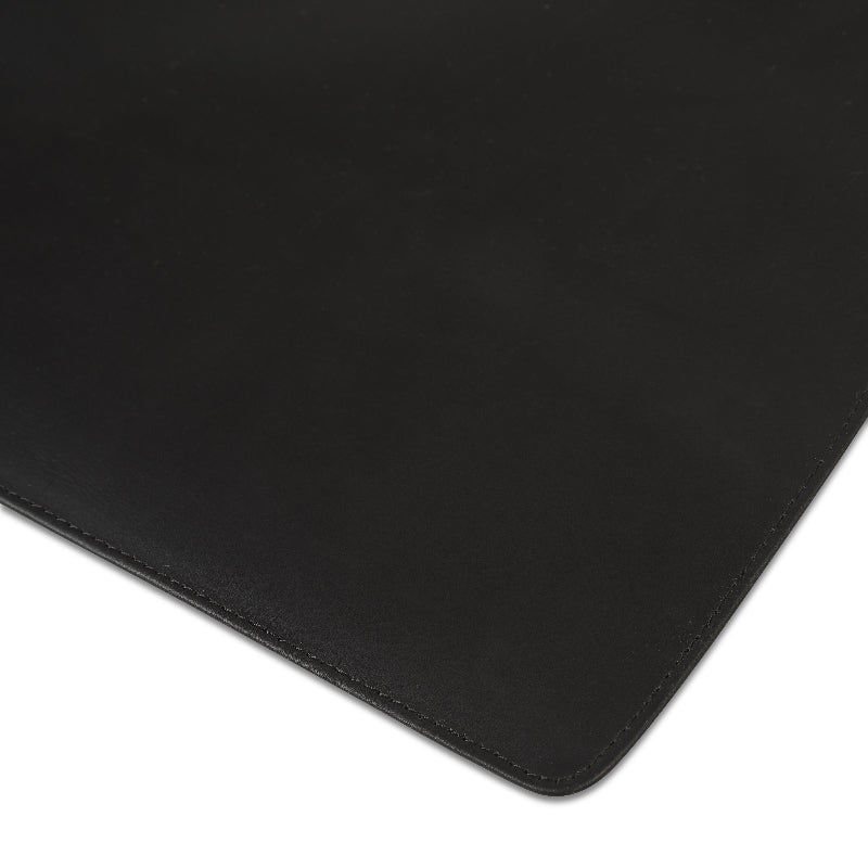 Black mouse pad on a white background