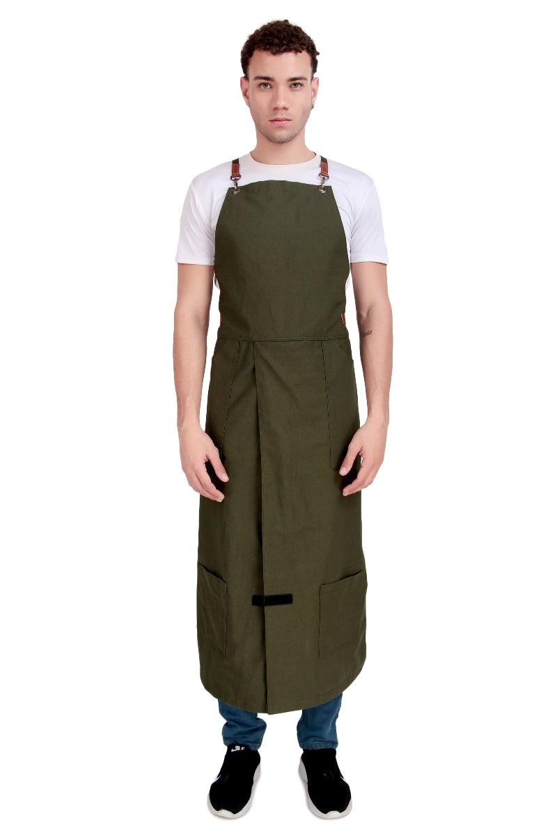 Man wearing an olive green apron on a white background