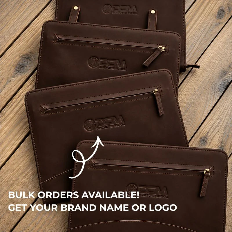 Stack of brown leather portfolios with embossed logos; bulk orders available.
