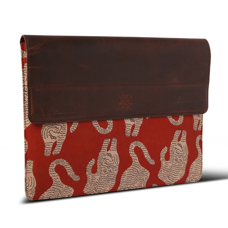 laptop sleeve with tiger pattern on a red background