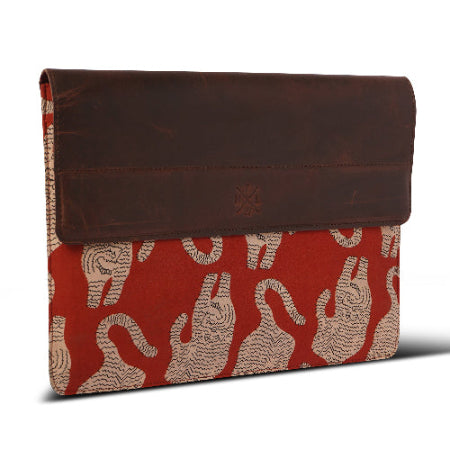 laptop sleeve and tiger pattern on a red background