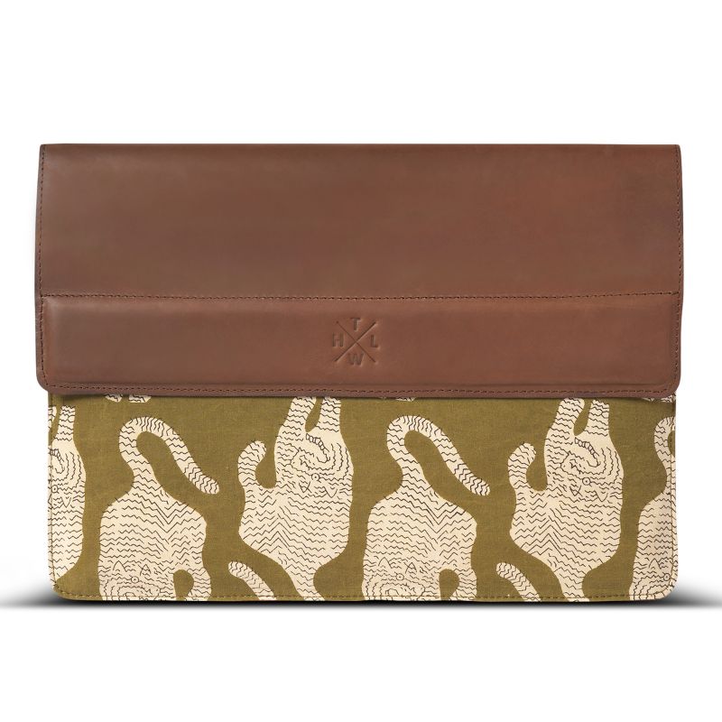laptop sleeve with brown top section and animal patterned bottom on a white background