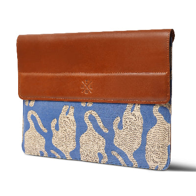Laptop sleeve with brown top section and blue base featuring animal pattern on a white background