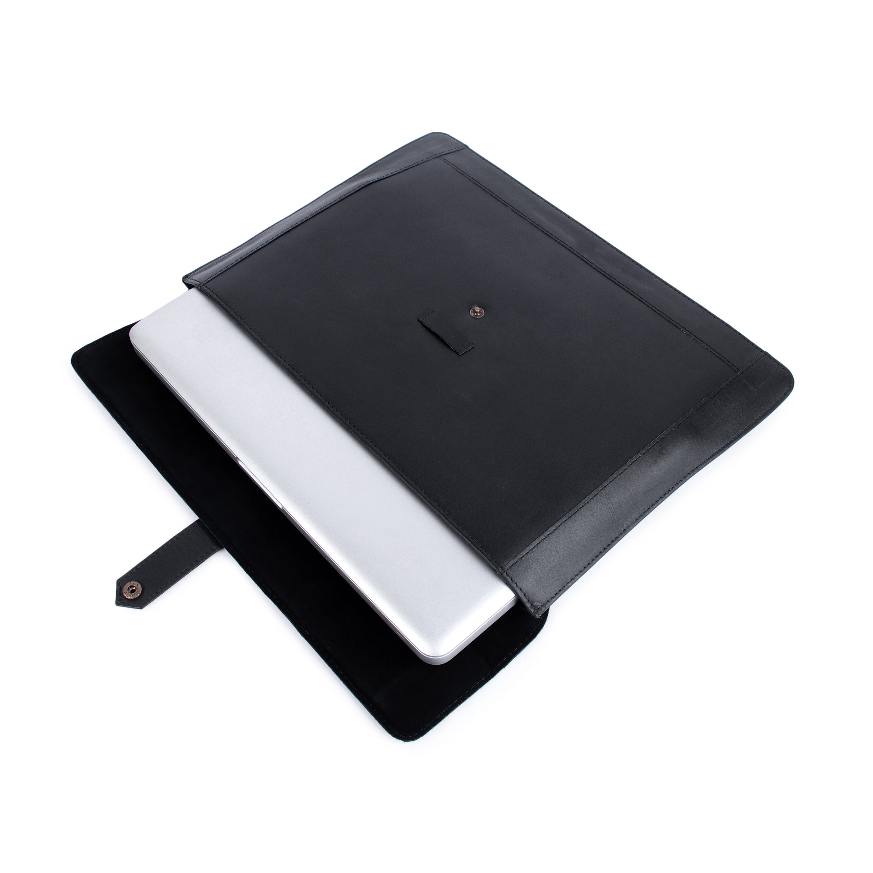 Black leather-bound notebook with a white interior on a white background
