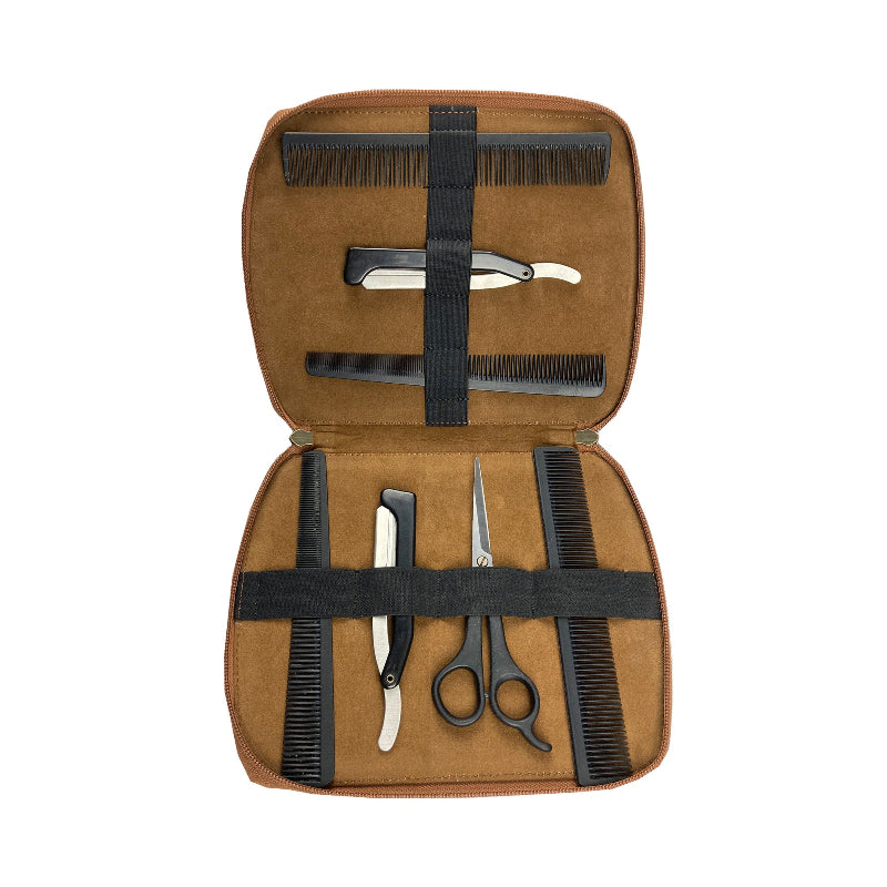 Barber kit with razors, scissors, and combs in a brown case on a white background