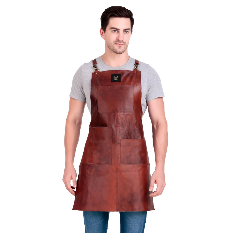 Man wearing a brown leather apron on a white background
