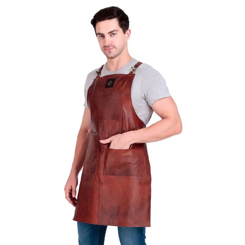 Man wearing a brown leather apron on a white background