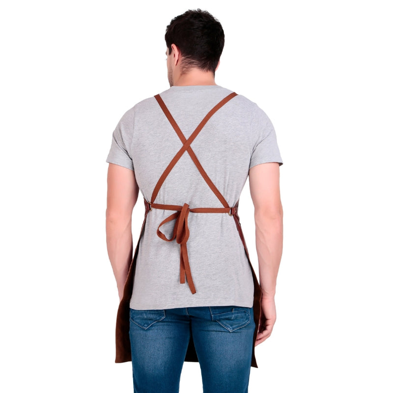 Person wearing a brown apron with cross straps on a white background