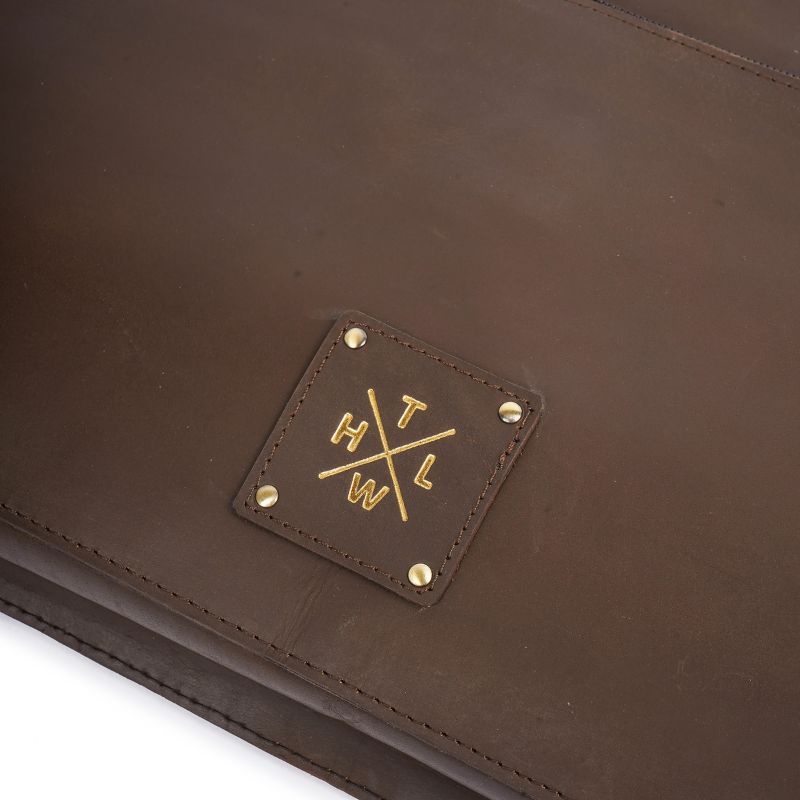 Chocolate Brown leather product with a gold logo on a white background