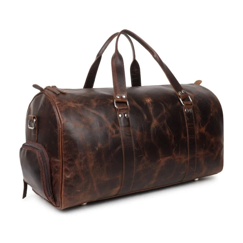 Brown leather duffel bag on a white background