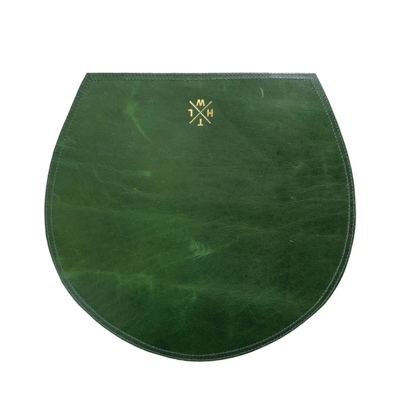 Green leather mat with a logo on a white background