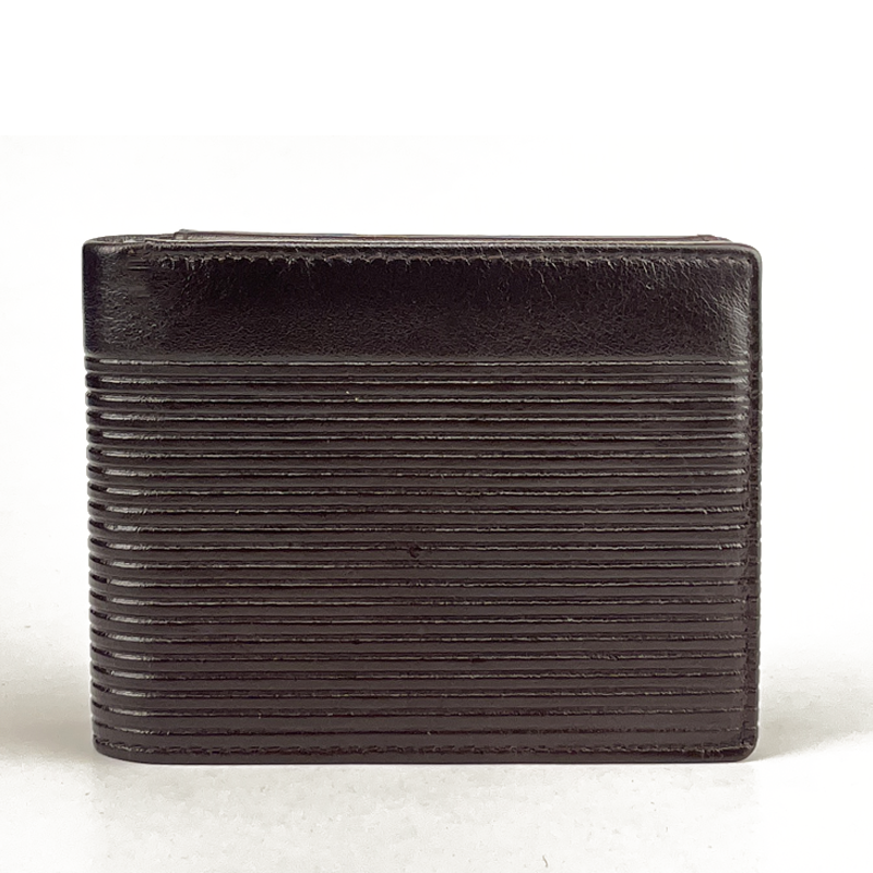 Black leather wallet with textured surface on a white background