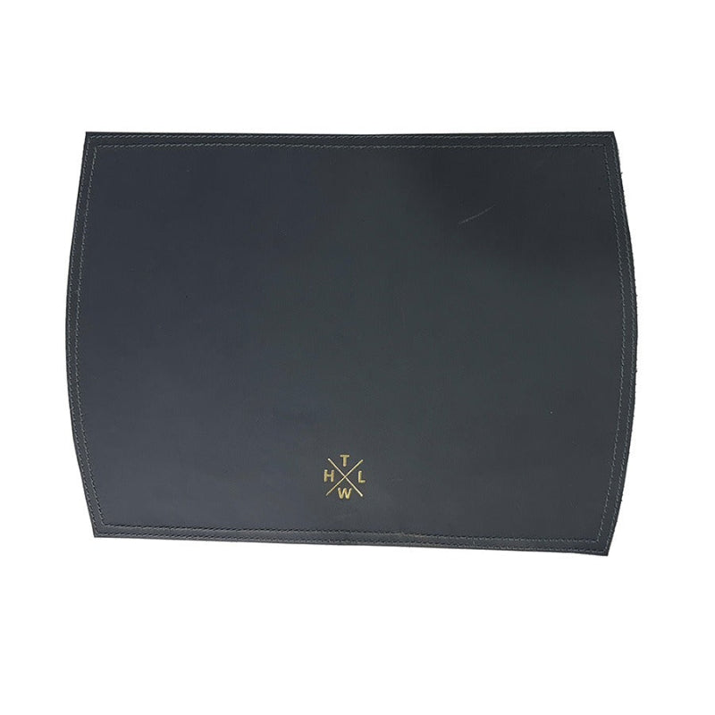Black leather pouch with gold logo on a white background