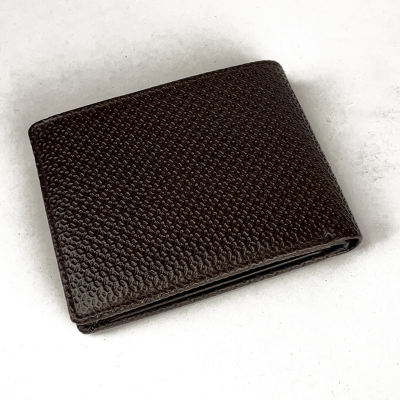 Brown textured wallet on a white background