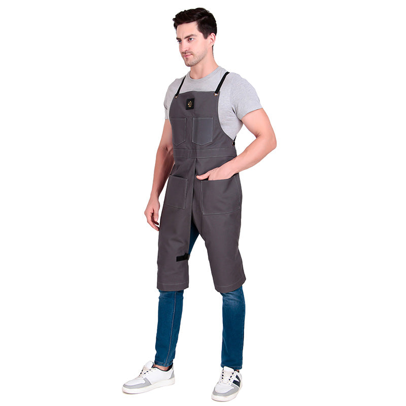 Man wearing gray overalls on a white background