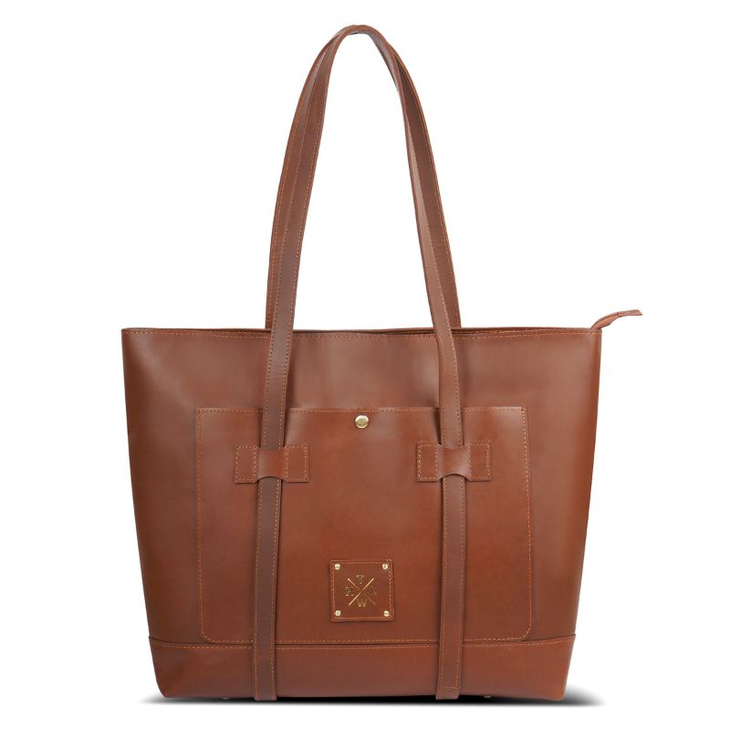 Brown leather tote bag with a visible brand logo on a white background