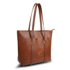 Brown leather tote bag with a visible brand logo on a white background