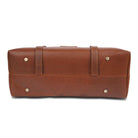 Brown leather bag with visible stitching on a white background