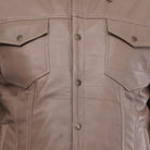 Close-up of a beige jacket with button details