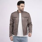 Man wearing a brown leather jacket on a white background
