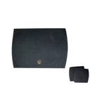 Black placemat with a logo and matching coasters on a white background