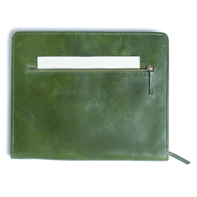 Green leather document folder with a front zipper pocket and a white sheet partially tucked into the horizontal slot above the zipper. Clean, minimalist design on a plain white background.
