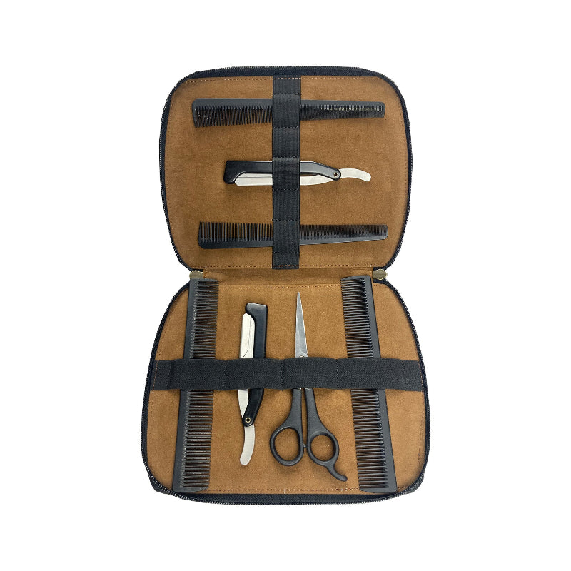 Set of grooming tools including scissors, razors, and combs in a brown case on a white background