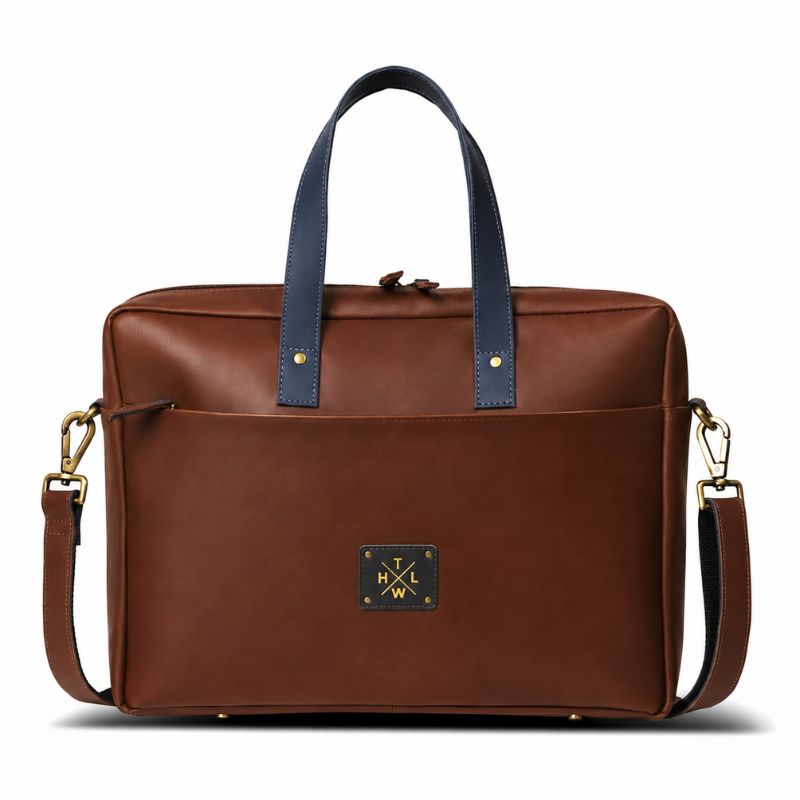 Brown leather laptop bag with blue handles and gold accents on a white background