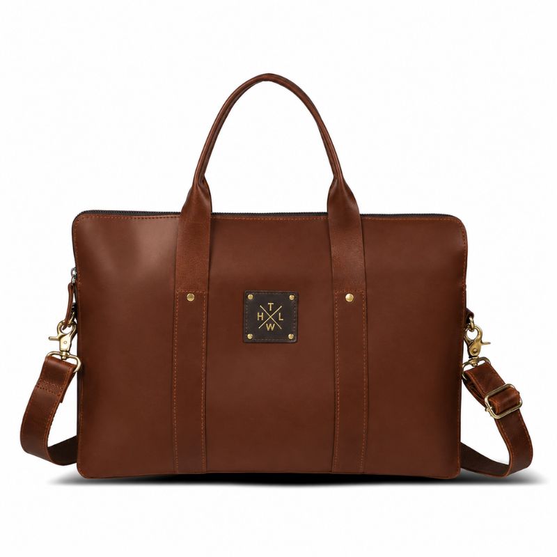 Brown leather bag with a visible brand logo on a white background