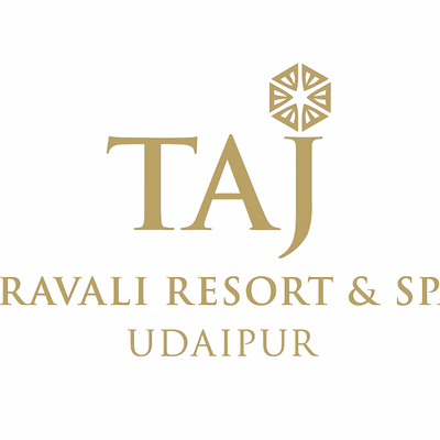 Gold logo of TAJ Ravali Resort & Spa Udaipur on a white background