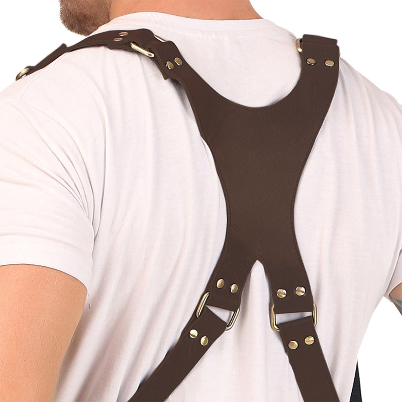 Back view of brown leather camera harness with wide panel and adjustable straps.