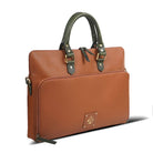 Angled view of a brown leather laptop bag with navy handles.